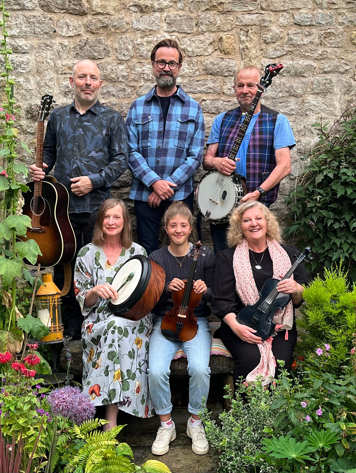 A group of six of the band.